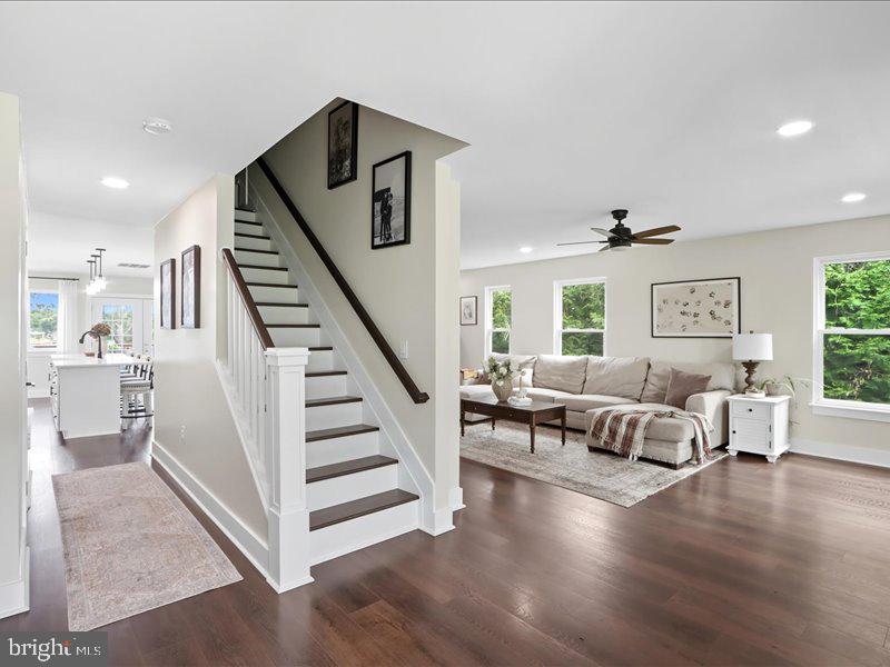 706 East Shore Road Pasadena, MD 21122 - Photo 10 of 32 a living room with furniture and a wooden floor
