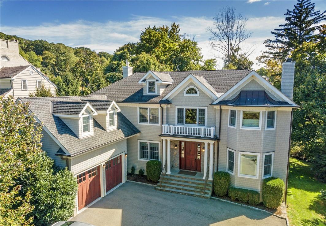 36 Riverview Road Irvington, NY 10533 - Photo 1 of 1 View of front facade with a garage