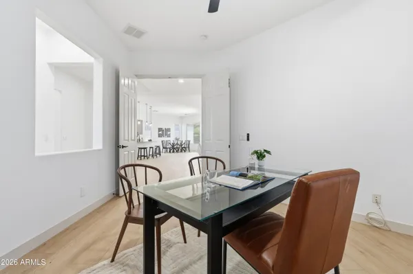 a kitchen with appliances a sink and cabinets