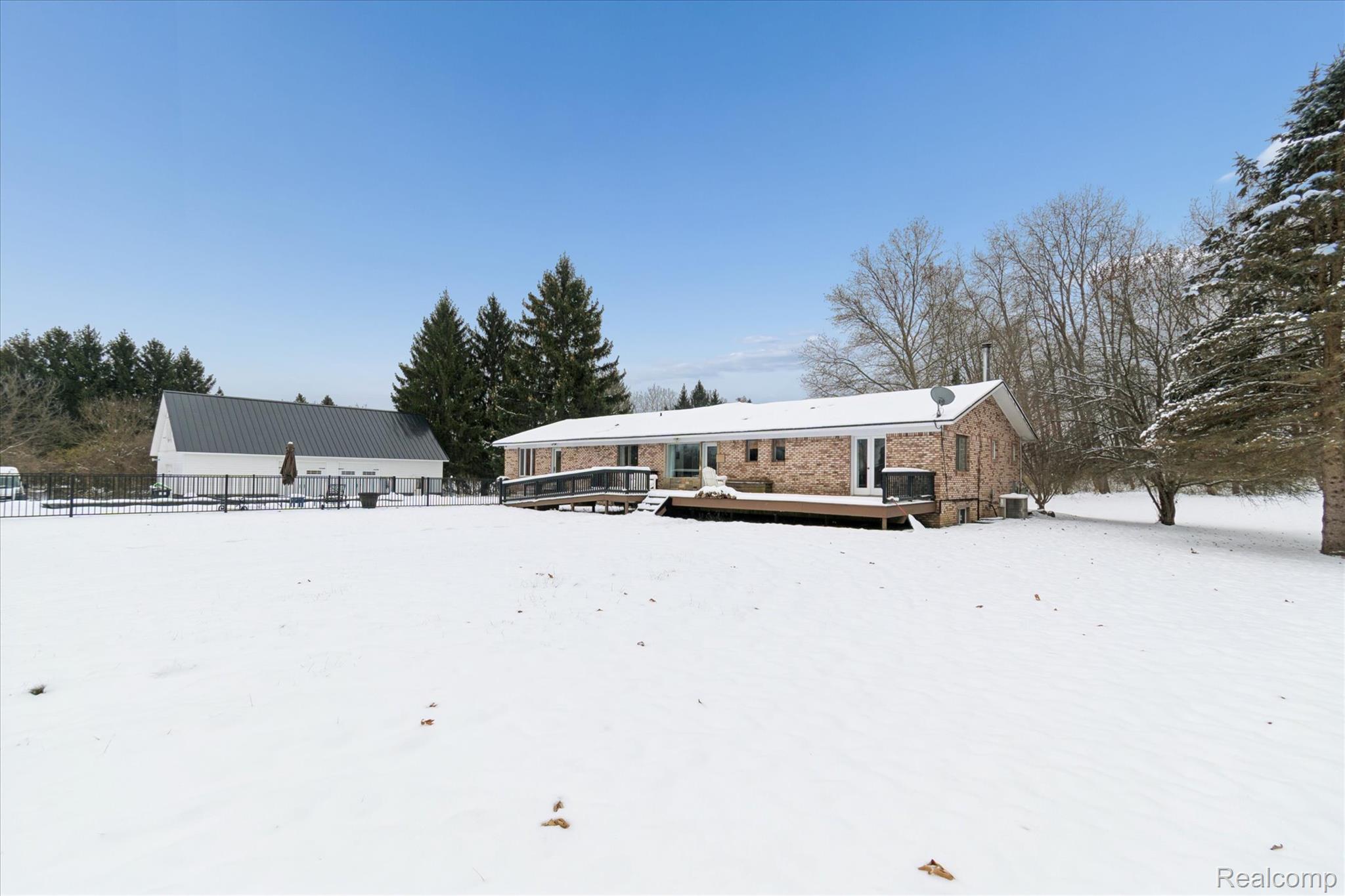 187 Darwin Road Pinckney, MI 48169 - Photo 56 of 71 Back view of home