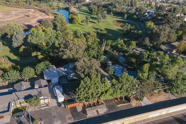 1218 Mitchell Road Modesto, CA 95351 - Photo 3 of 4 an aerial view of residential house with outdoor space and trees all around