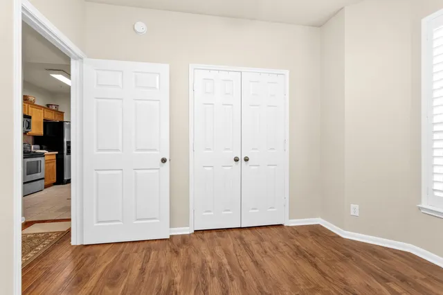 a bedroom with bed and tv