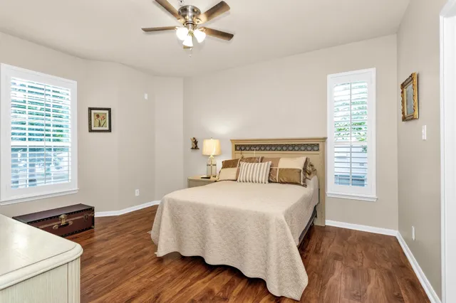 a bathroom with a sink a toilet and vanity
