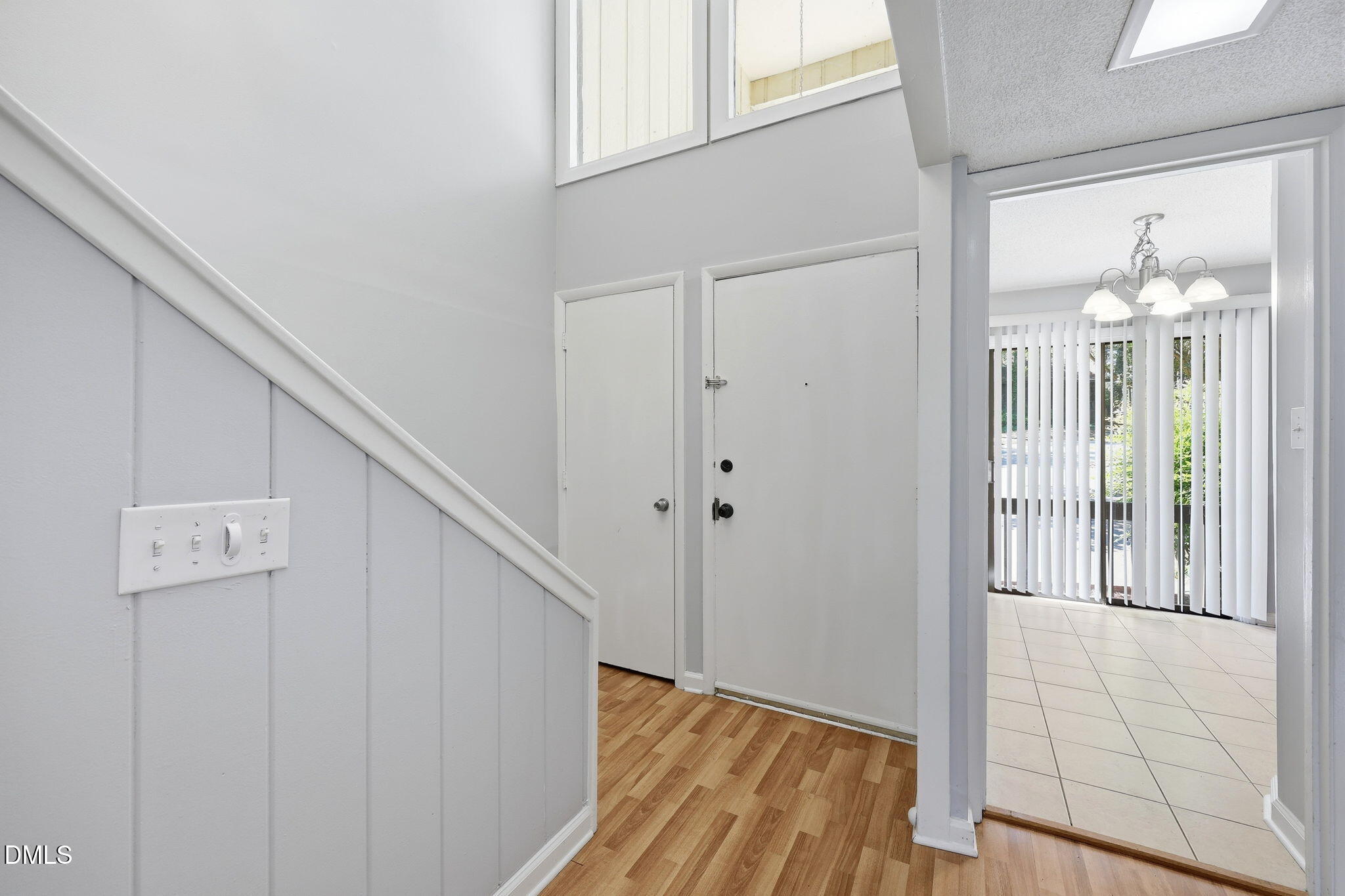 5043 Tall Pines Court Raleigh, NC 27609 - Photo 2 of 37 a view of entryway with wooden floor
