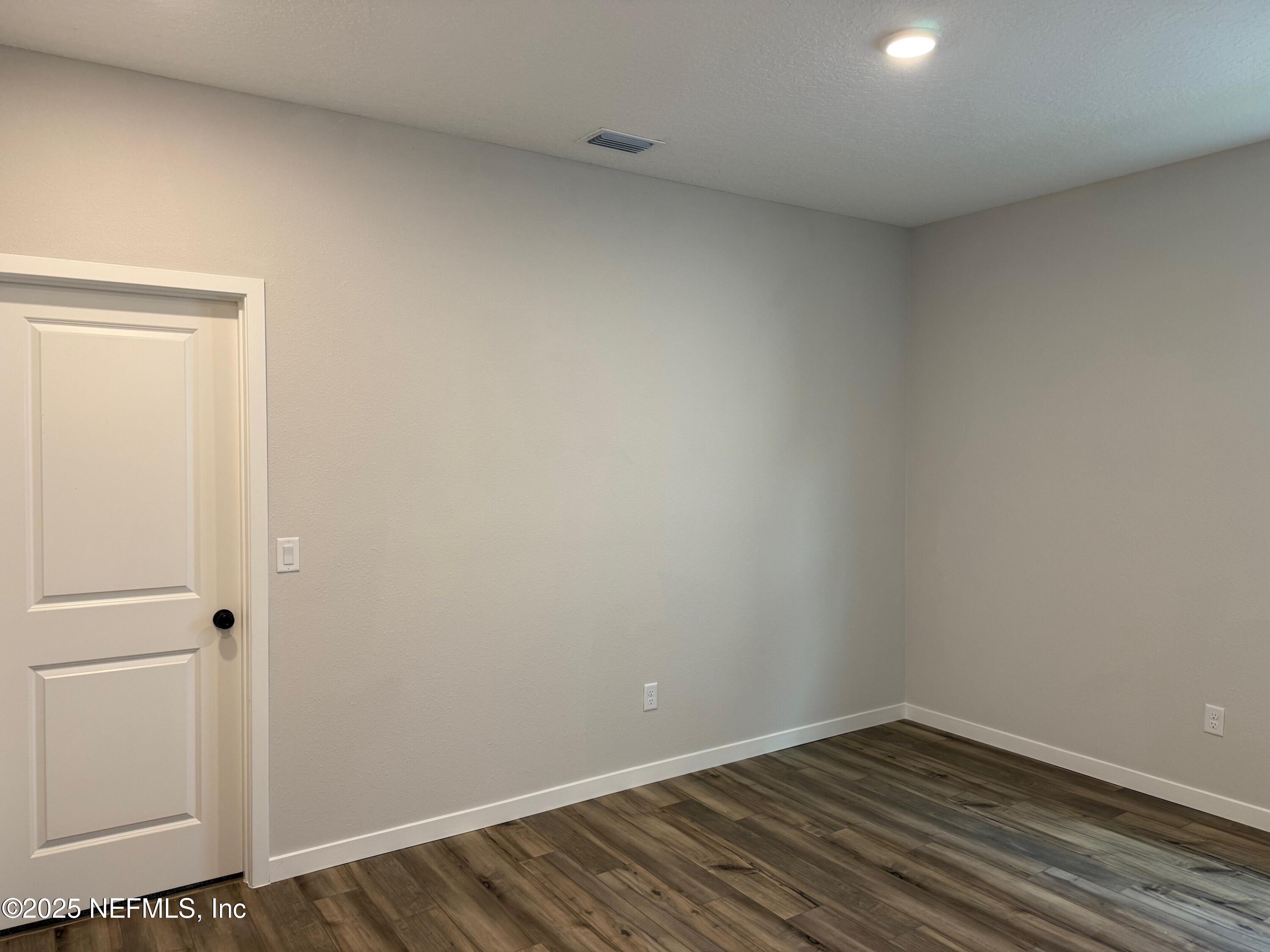 96517 Stillpoint Way Fernandina Beach, FL 32034 - Photo 6 of 9 a view of an empty room