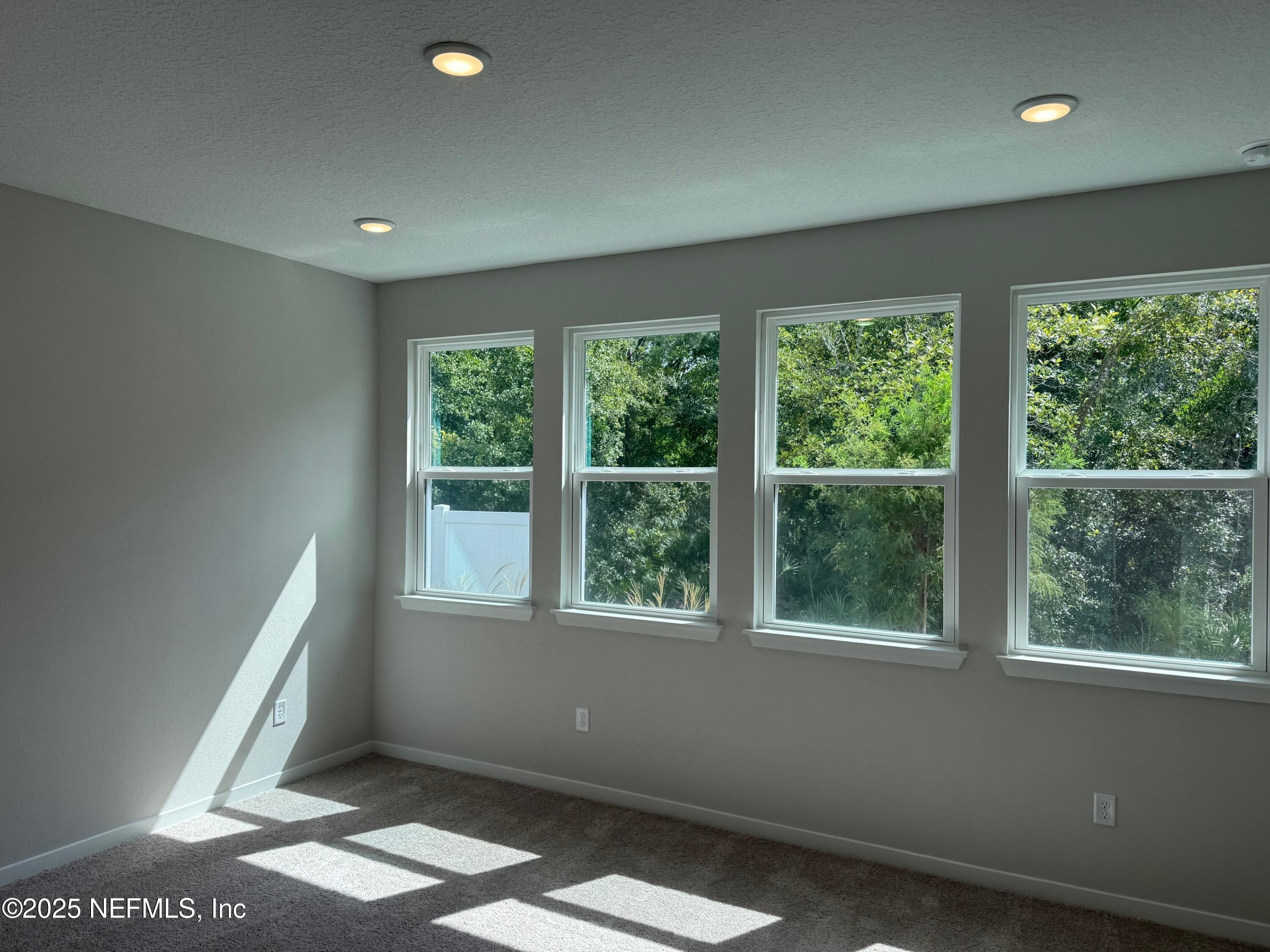 96517 Stillpoint Way Fernandina Beach, FL 32034 - Photo 8 of 9 a view of an empty room with a window