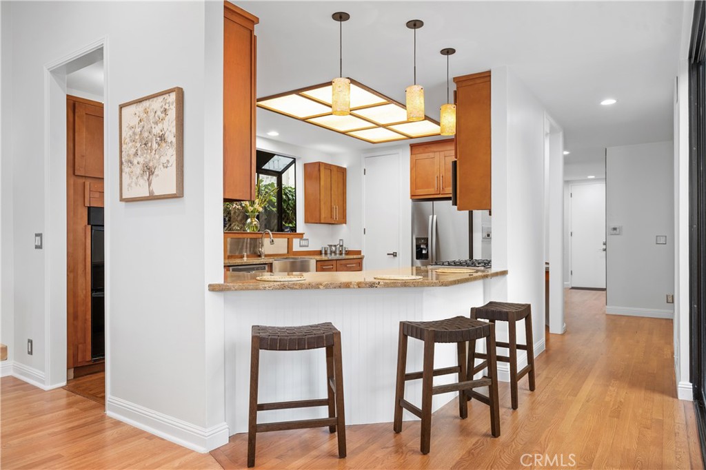 341 S Meadows Manhattan Beach, CA 90266 - Photo 15 of 54 Open Kitchen hang out next to the central patio of the home