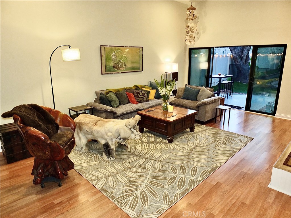 341 S Meadows Manhattan Beach, CA 90266 - Photo 23 of 54 a living room with furniture or couch and a wooden floor