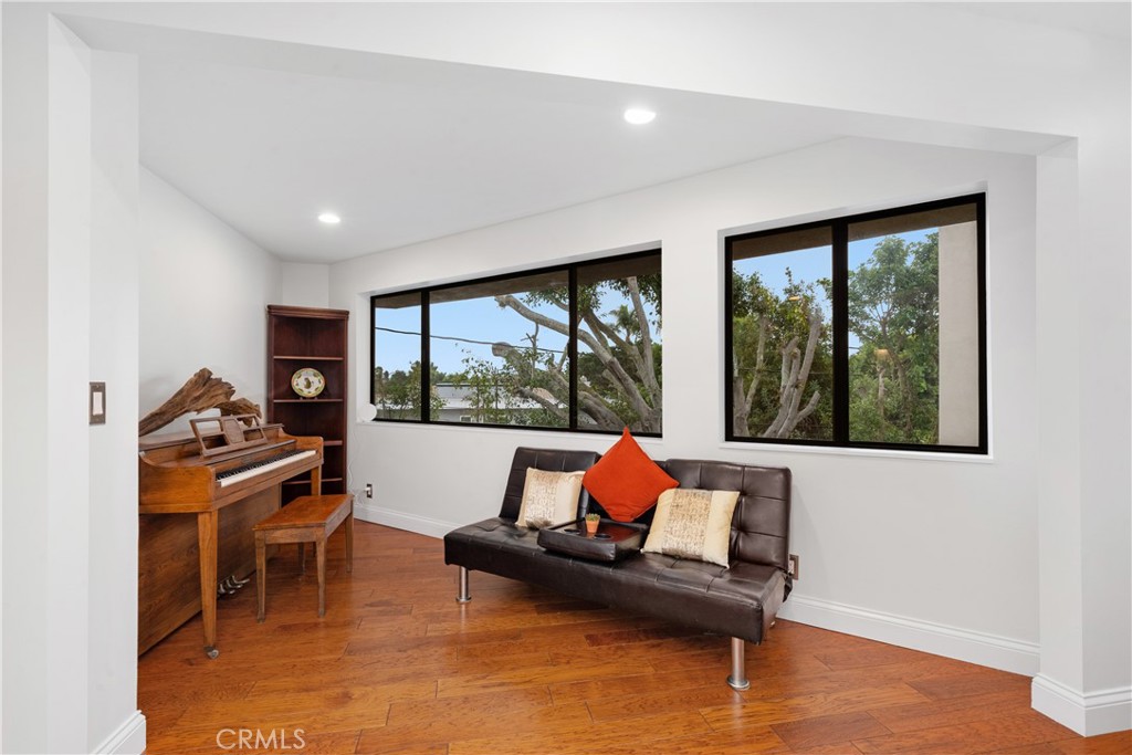 341 S Meadows Manhattan Beach, CA 90266 - Photo 26 of 54 a living room with furniture and a large window