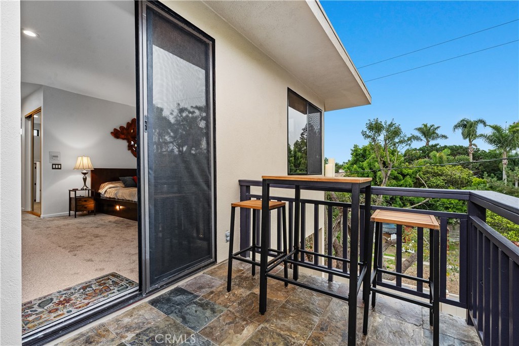 341 S Meadows Manhattan Beach, CA 90266 - Photo 30 of 54 a view of a porch with a bench