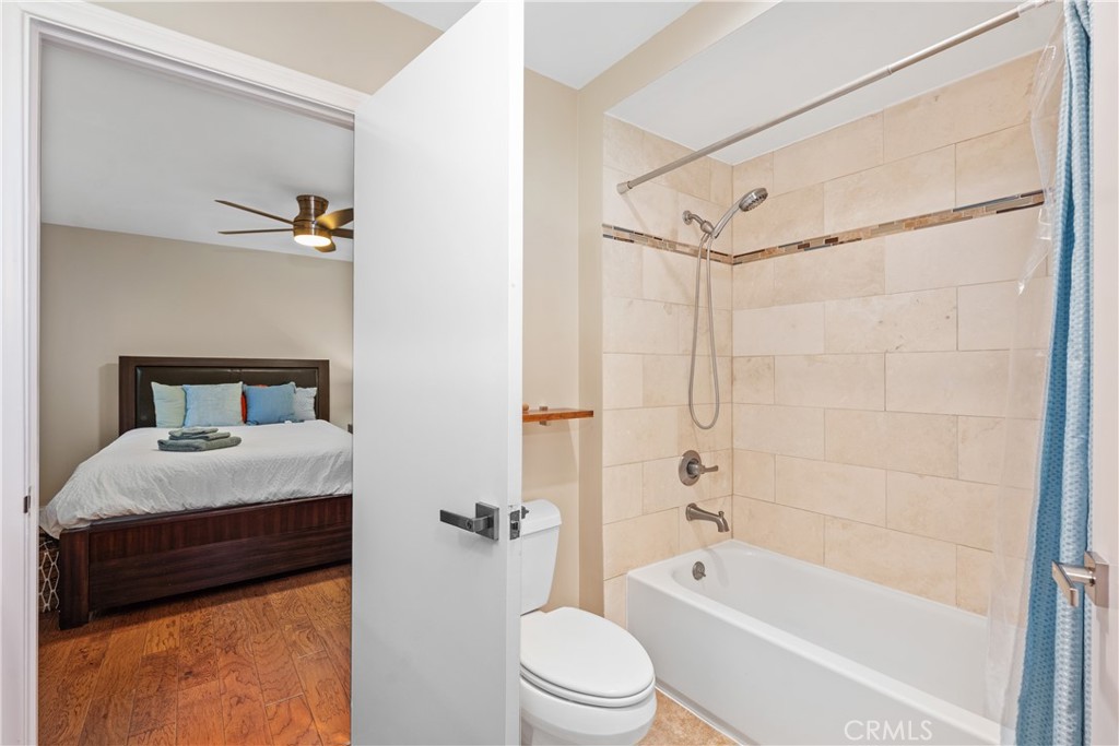 341 S Meadows Manhattan Beach, CA 90266 - Photo 39 of 54 a bathroom with a granite countertop sink a toilet and shower