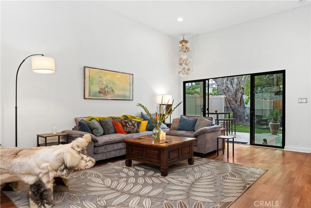 341 S Meadows Manhattan Beach, CA 90266 - Photo 5 of 54 Fireside , wet bar living room leads to margarita pool and courtyard patio, mid-century style