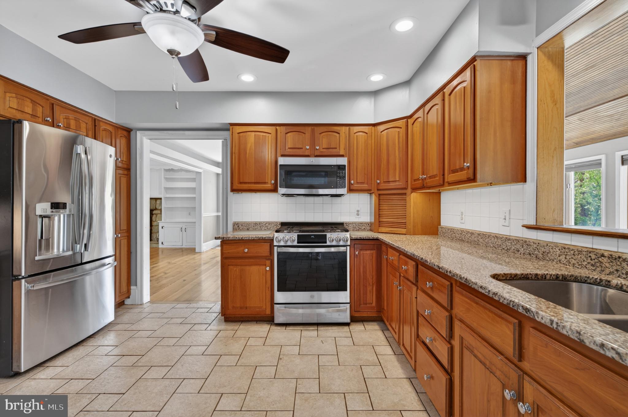 300 Sanatoga Road Pottstown, PA 19465 - Photo 23 of 79 Modern kitchen with warm wood accents.