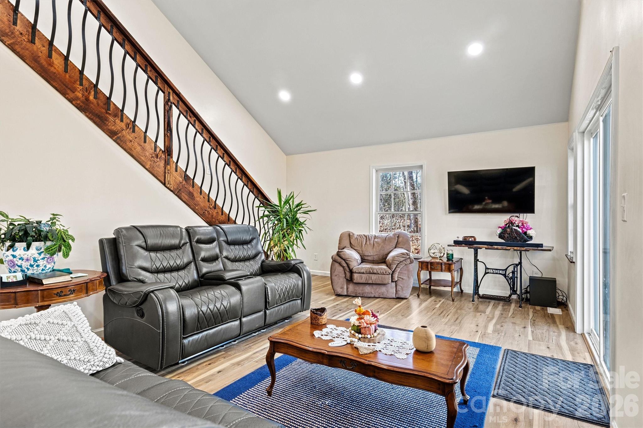 6051 Pointe W Lane Vale, NC 28168 - Photo 12 of 28 a living room with furniture and a flat screen tv