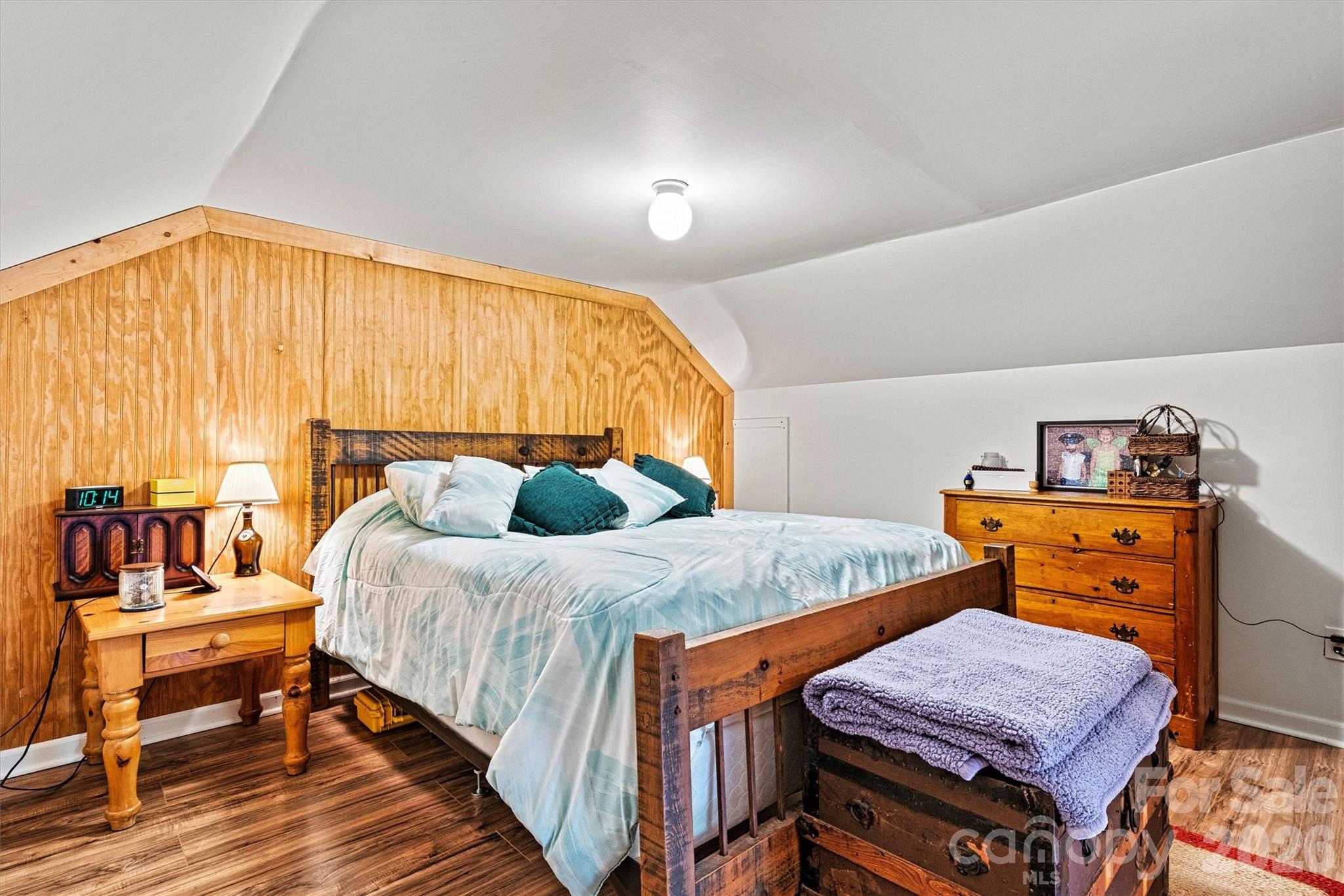 6051 Pointe W Lane Vale, NC 28168 - Photo 21 of 28 a bedroom with a bed and wooden floor