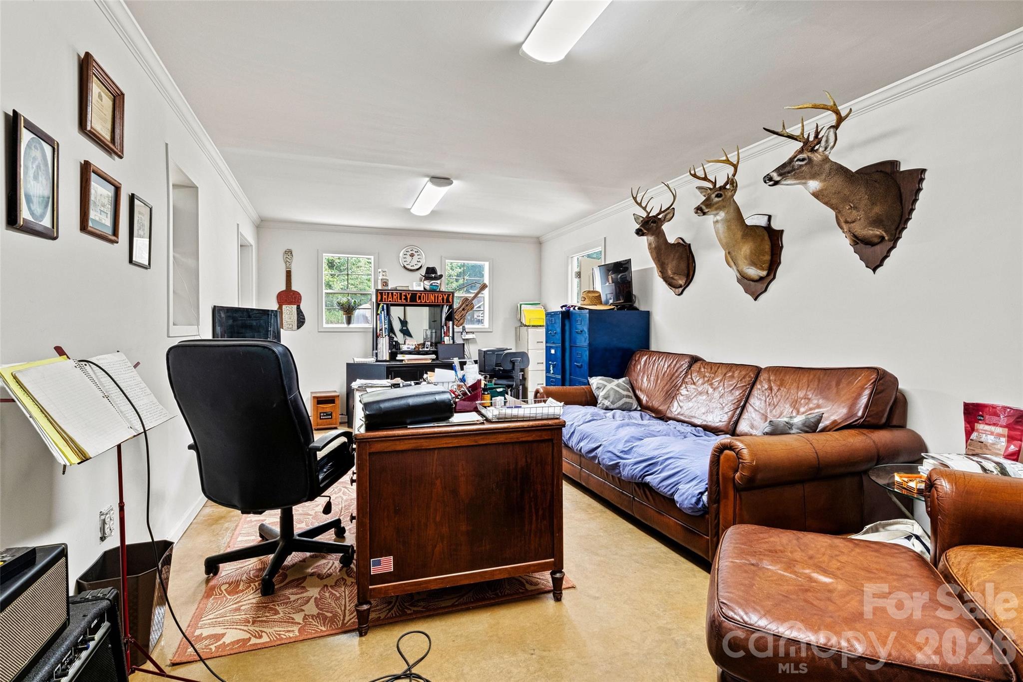 6051 Pointe W Lane Vale, NC 28168 - Photo 28 of 28 a living room with furniture or couch and a potted plant