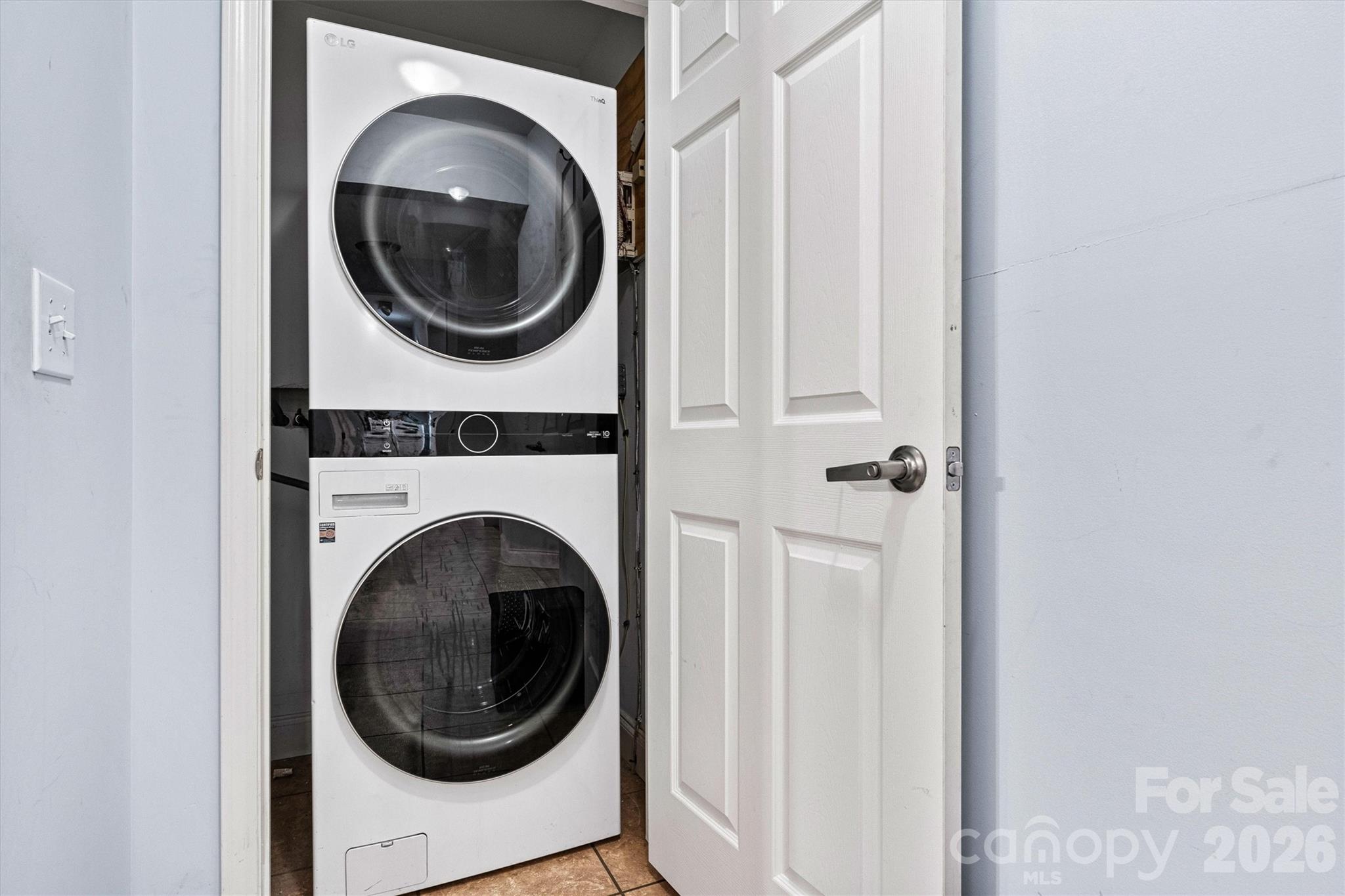 6051 Pointe W Lane Vale, NC 28168 - Photo 7 of 28 a utility room with dryer and washer