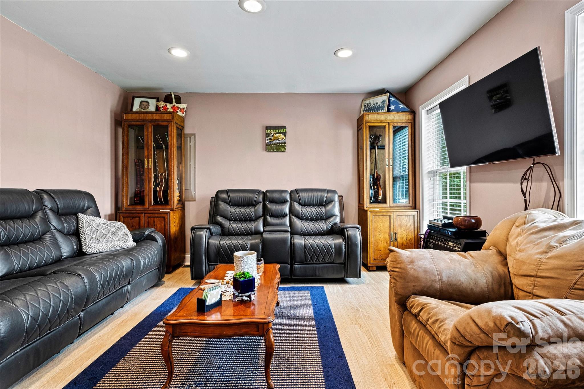 6051 Pointe W Lane Vale, NC 28168 - Photo 9 of 28 a living room with furniture and a flat screen tv