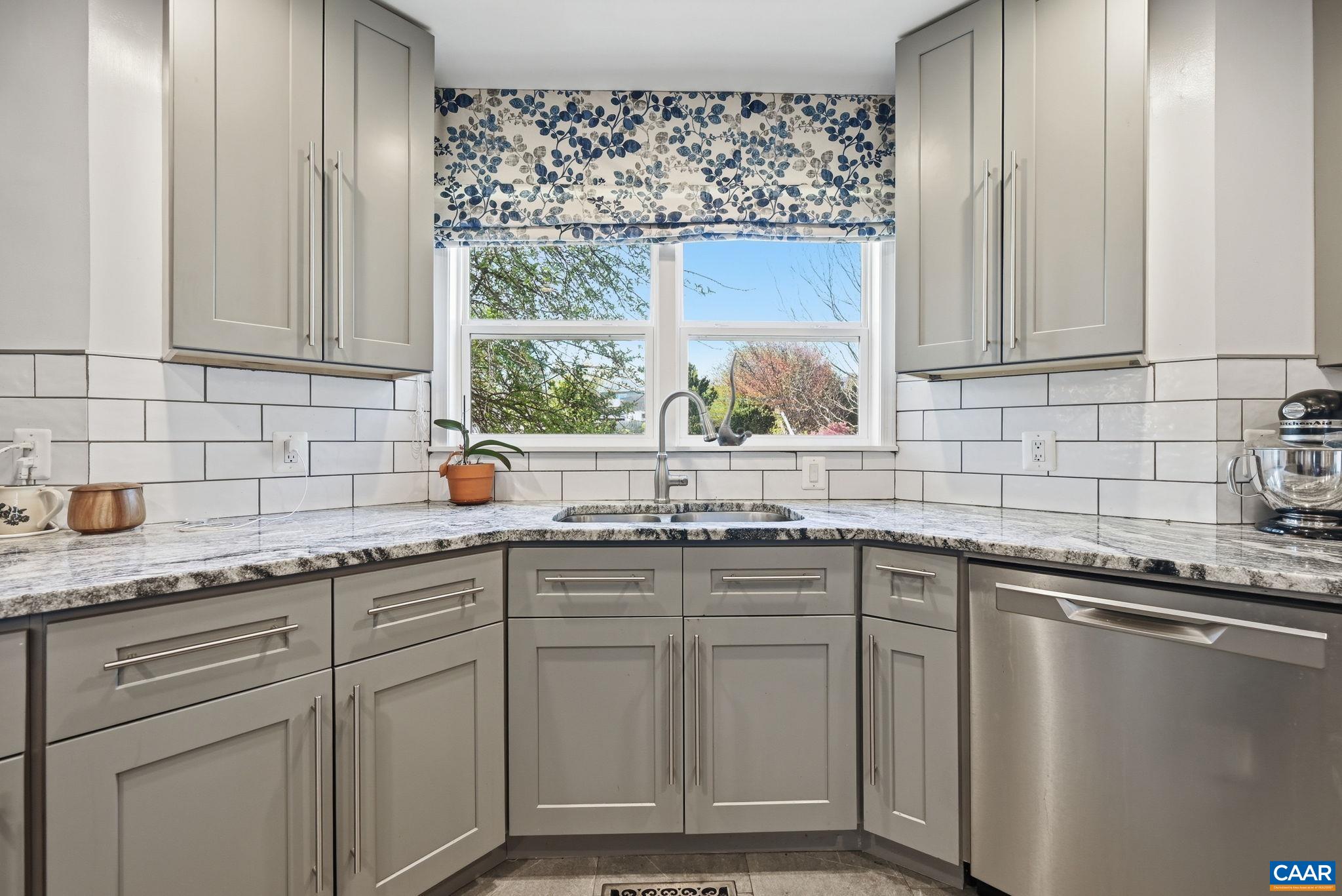 101 Marjorie Lane Ruckersville, VA 22968 - Photo 15 of 61 a kitchen with granite countertop cabinets stainless steel appliances a sink and a window