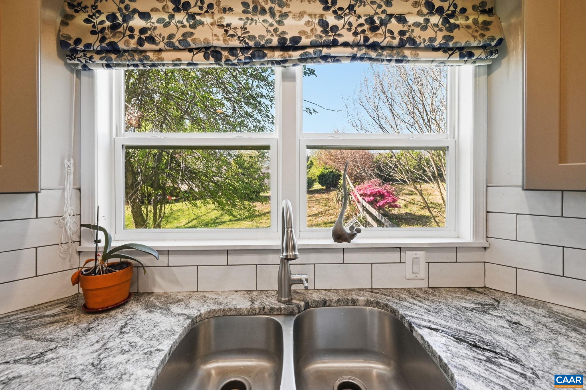 101 Marjorie Lane Ruckersville, VA 22968 - Photo 17 of 61 a view of a kitchen with granite countertop a sink and a window