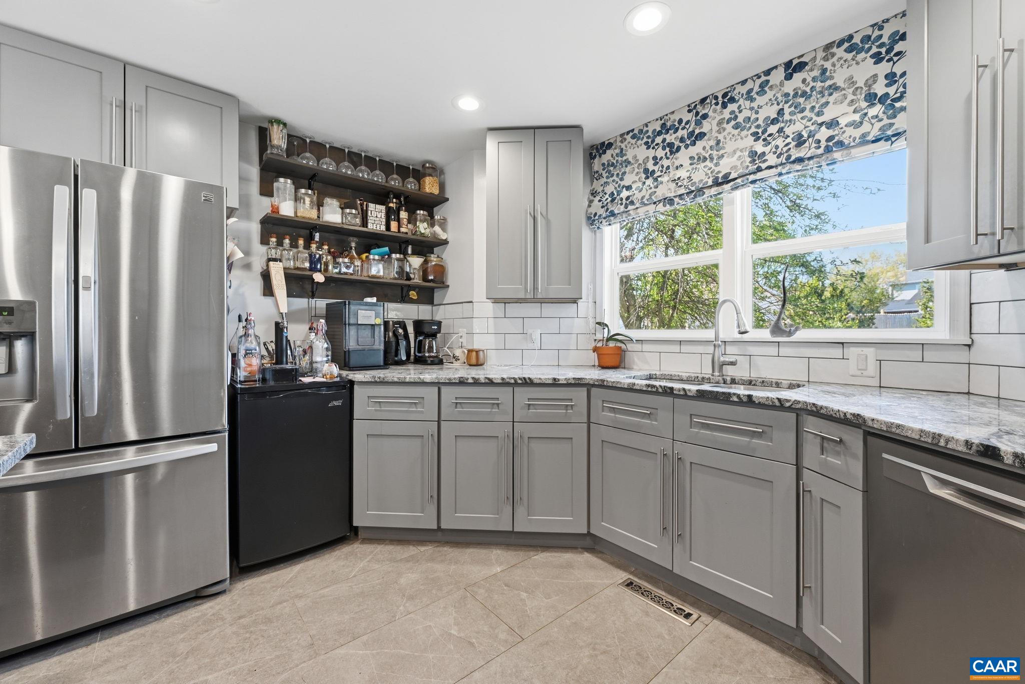 101 Marjorie Lane Ruckersville, VA 22968 - Photo 20 of 61 a kitchen with a refrigerator and windows