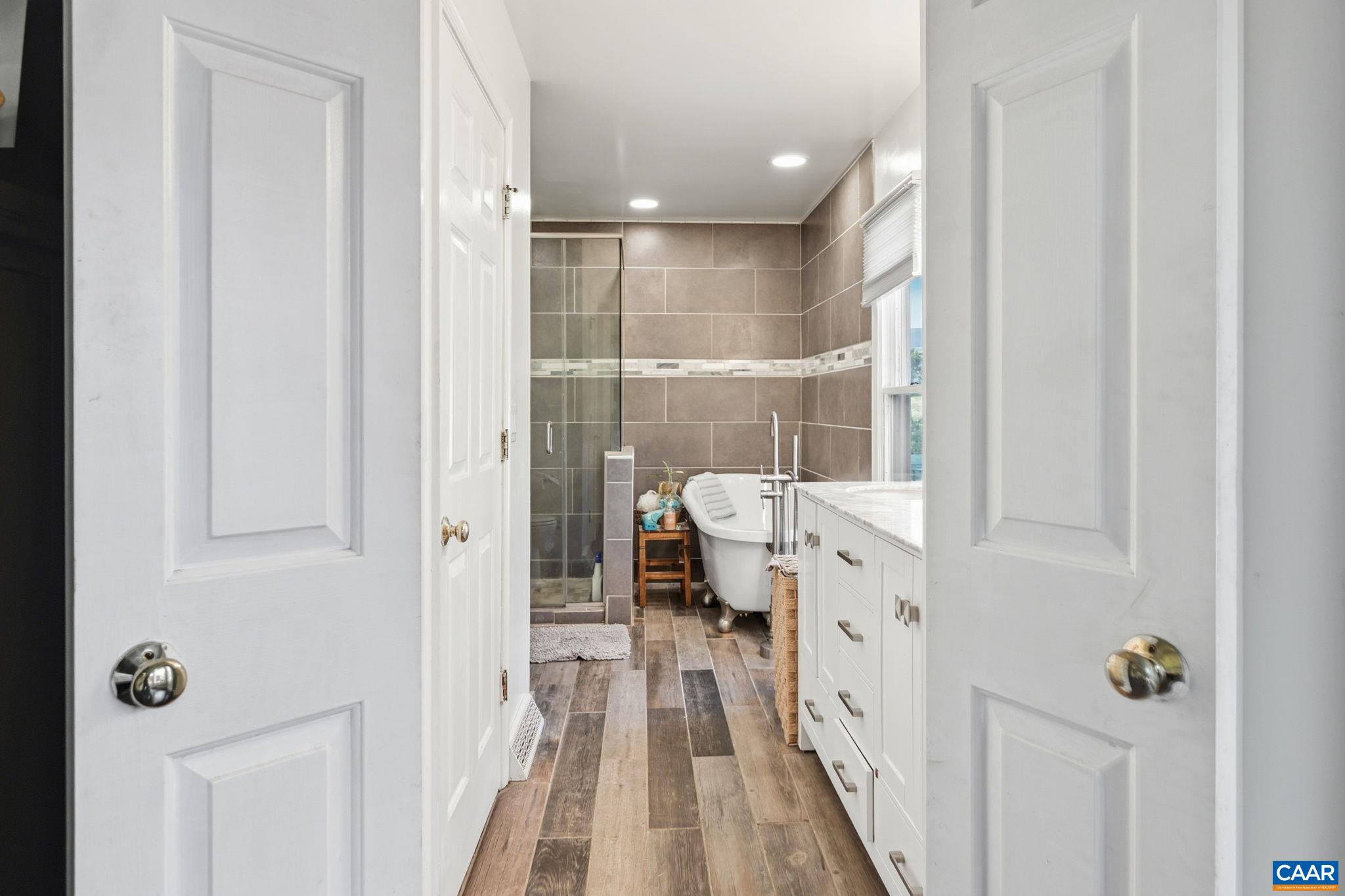 101 Marjorie Lane Ruckersville, VA 22968 - Photo 28 of 61 a bathroom with a sink and mirror