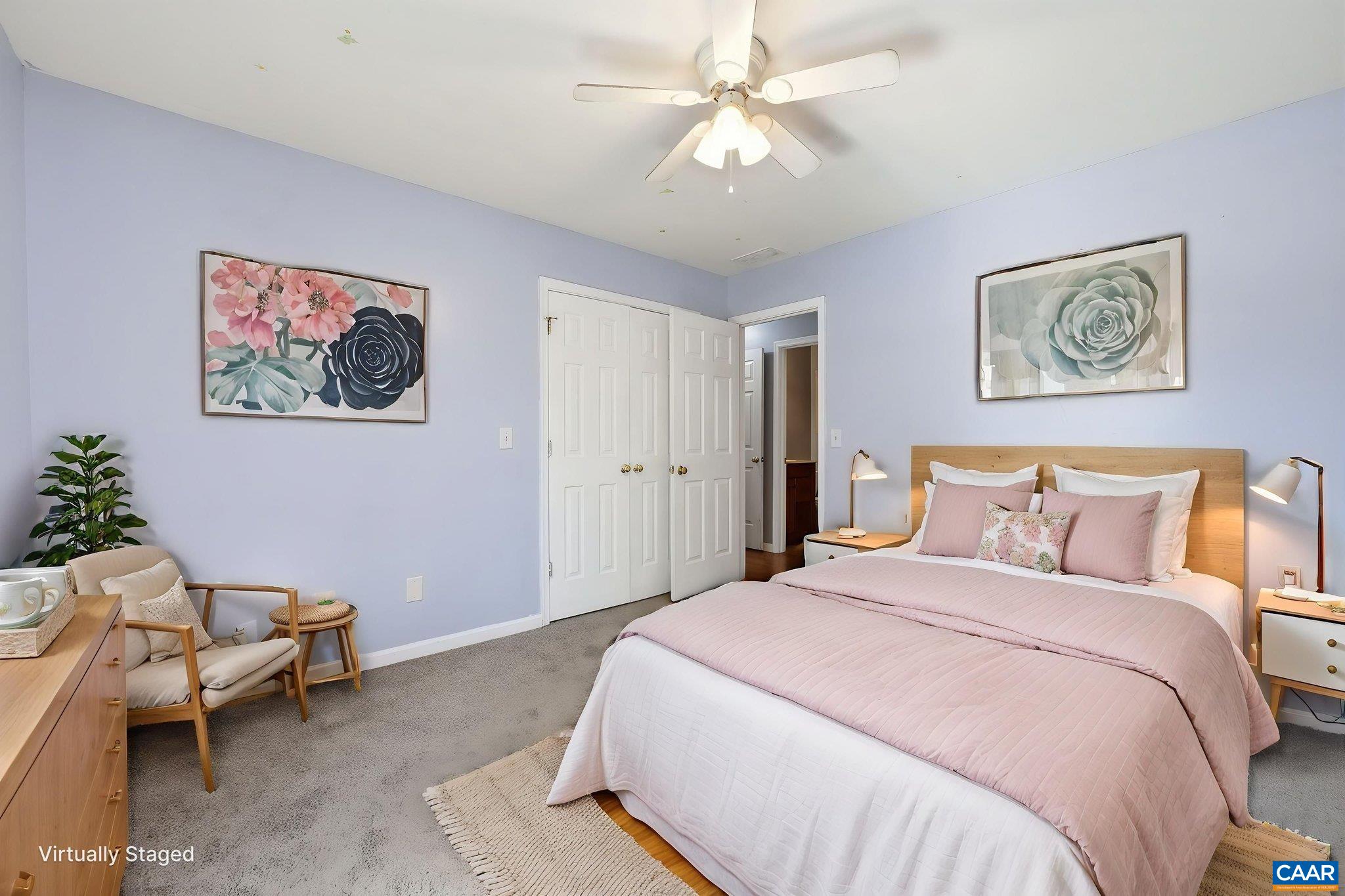 101 Marjorie Lane Ruckersville, VA 22968 - Photo 35 of 61 a bedroom with a bed and a chandelier