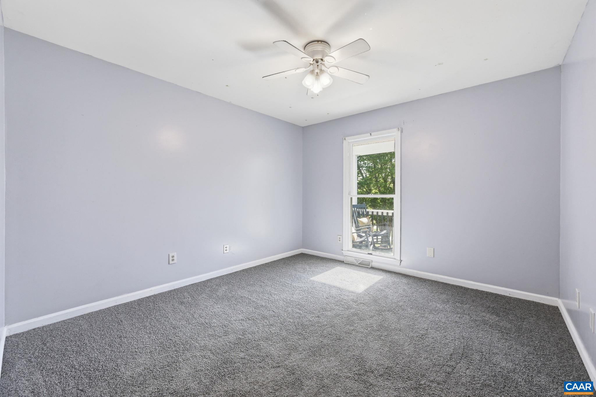 101 Marjorie Lane Ruckersville, VA 22968 - Photo 36 of 61 an empty room with windows and fan