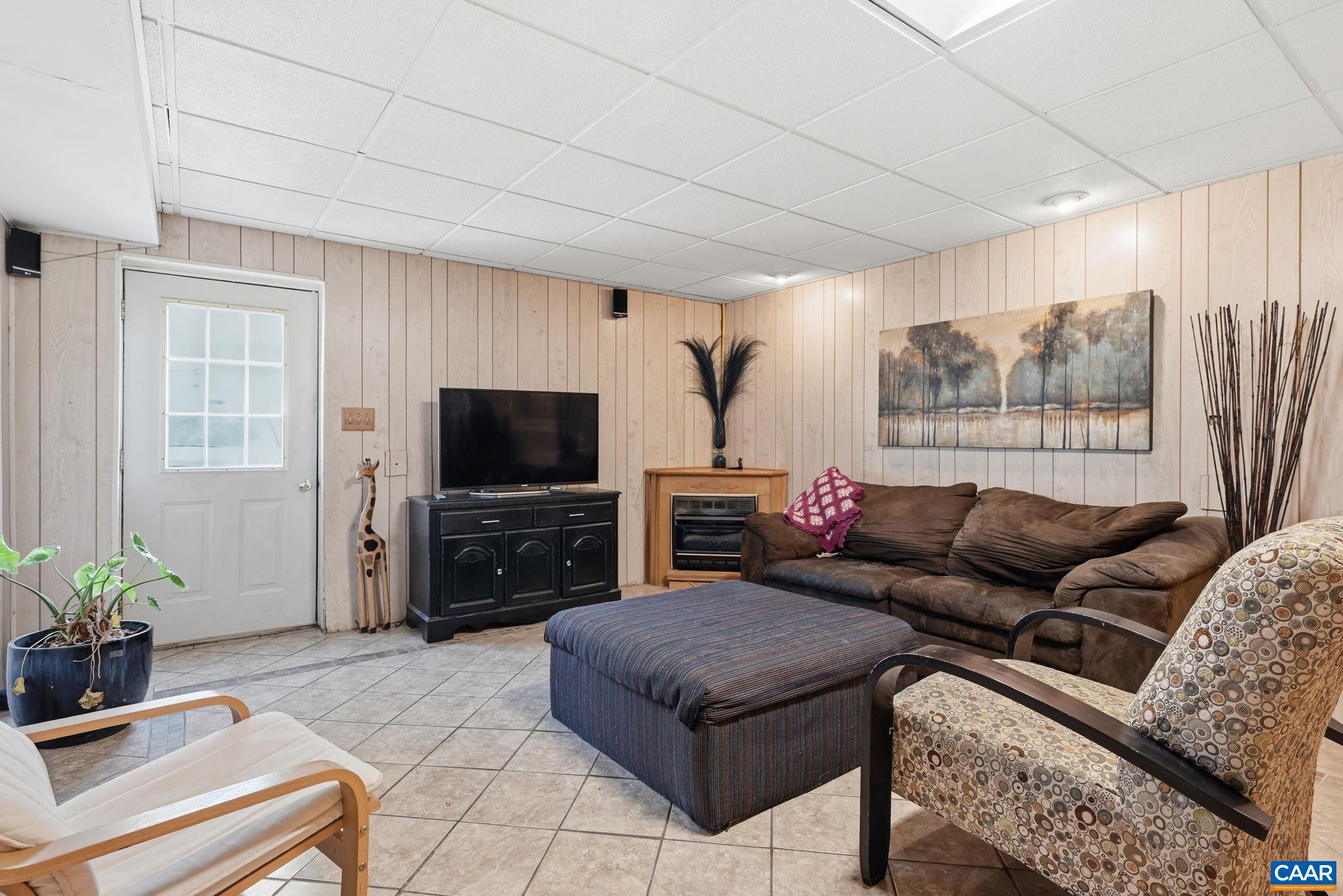 101 Marjorie Lane Ruckersville, VA 22968 - Photo 37 of 61 a living room with furniture and a flat screen tv