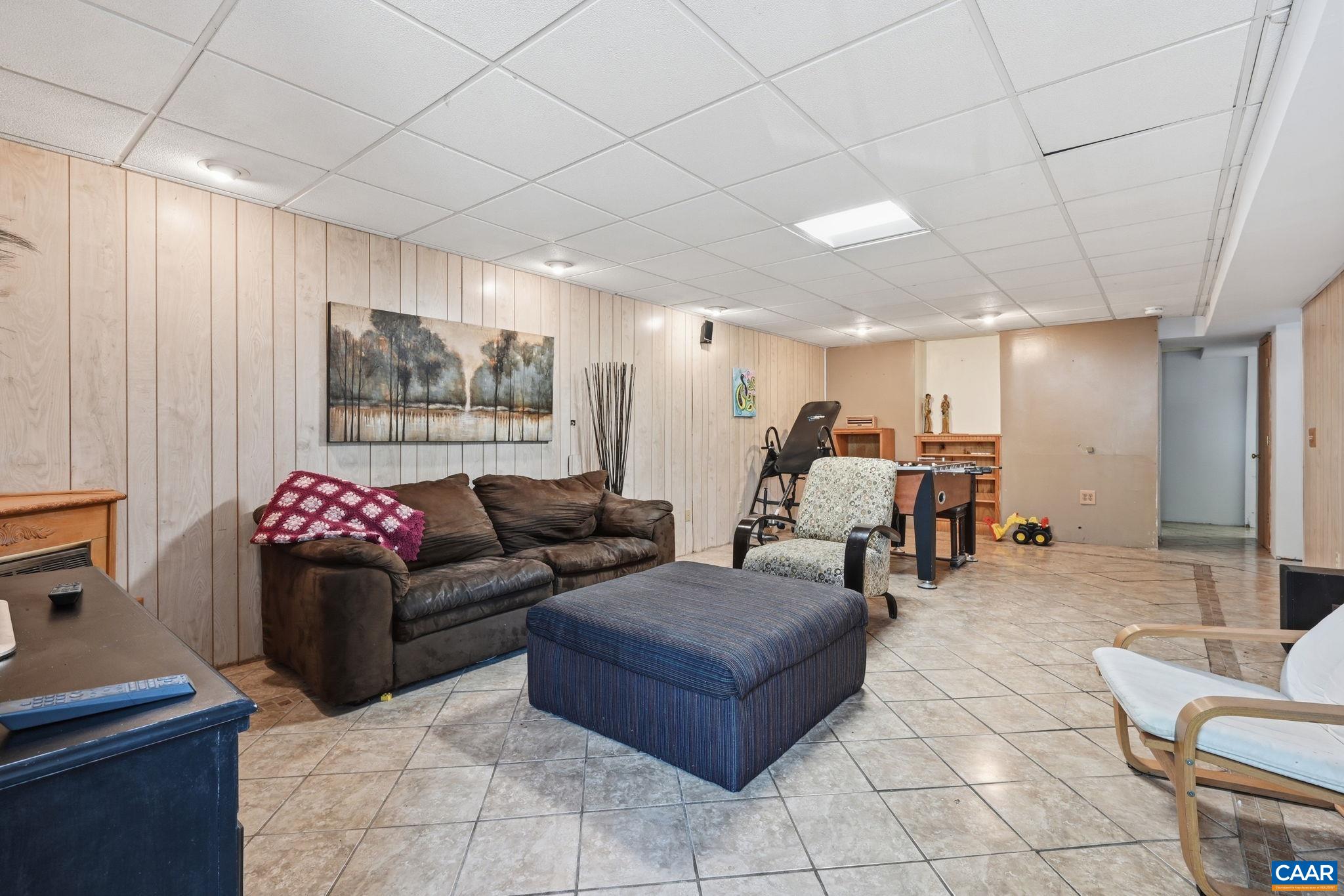 101 Marjorie Lane Ruckersville, VA 22968 - Photo 39 of 61 a living room with furniture and a flat screen tv