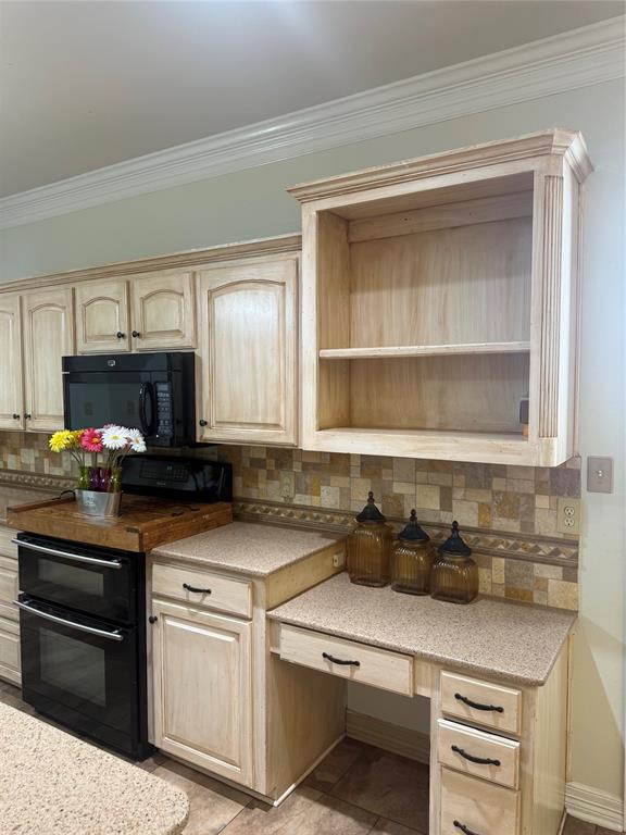 201 Woodhaven Drive Minden, LA 71055 - Photo 9 of 31 Kitchen featuring distressed wood cabinetry, speckled countertops, a double wall oven, microwave, and a decorative tile backsplash