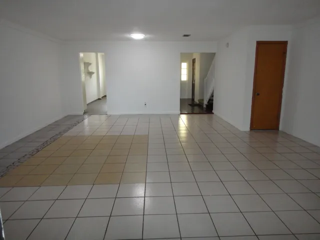 a view of a room that has a window in it