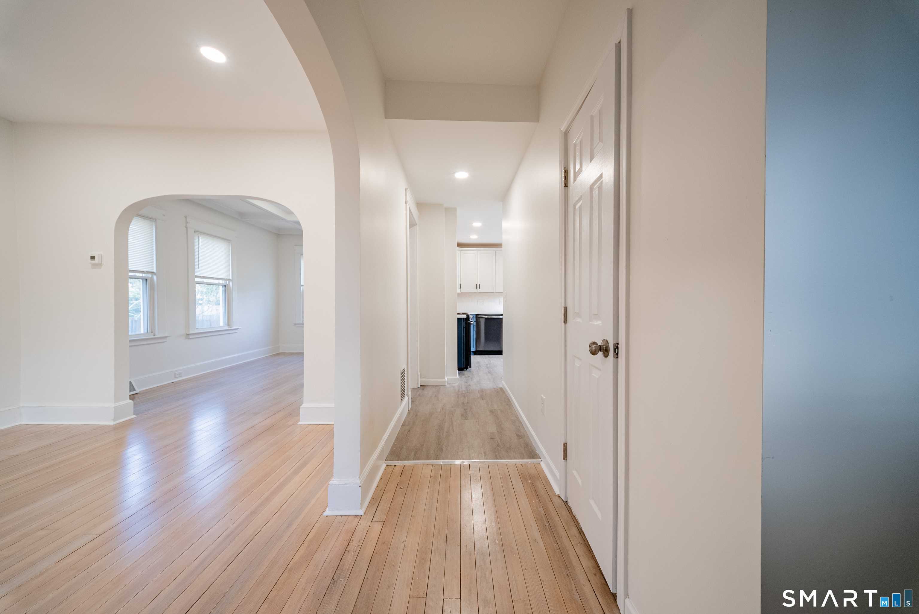 50 Jones Street West Haven, CT 06516 - Photo 1 of 21 a view of a hallway with wooden floor