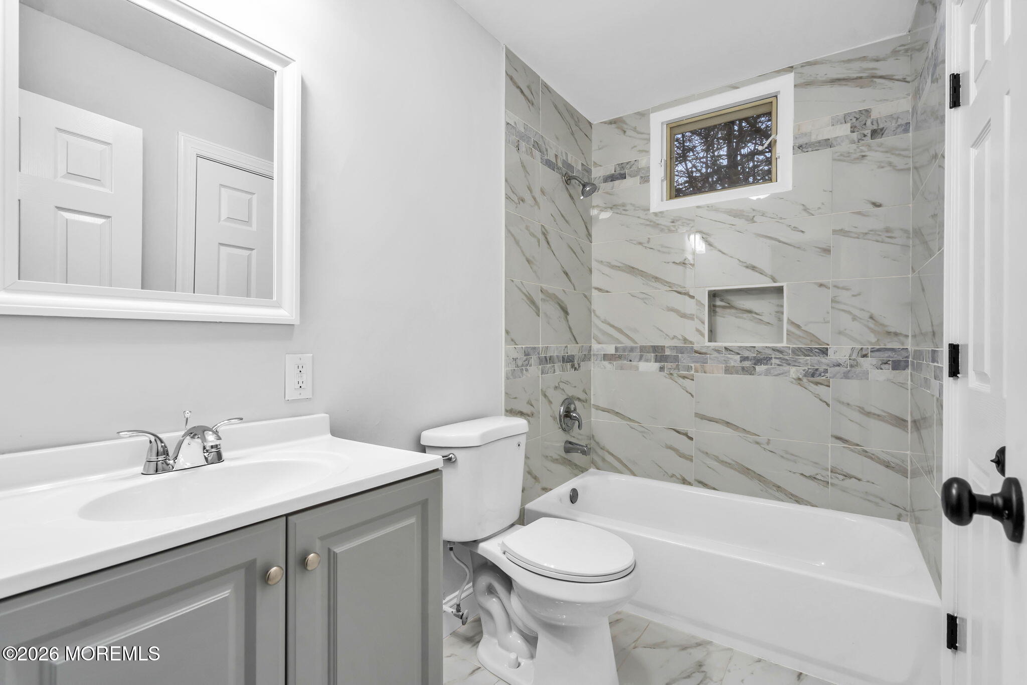 29 Keene Street, Unit 70 Whiting, NJ 08759 - Photo 13 of 18 a bathroom with a sink toilet and shower