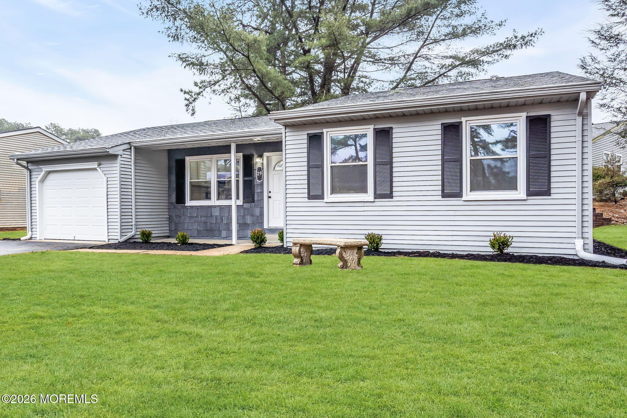 29 Keene Street, Unit 70 Whiting, NJ 08759 - Photo 2 of 18 a front view of house with yard
