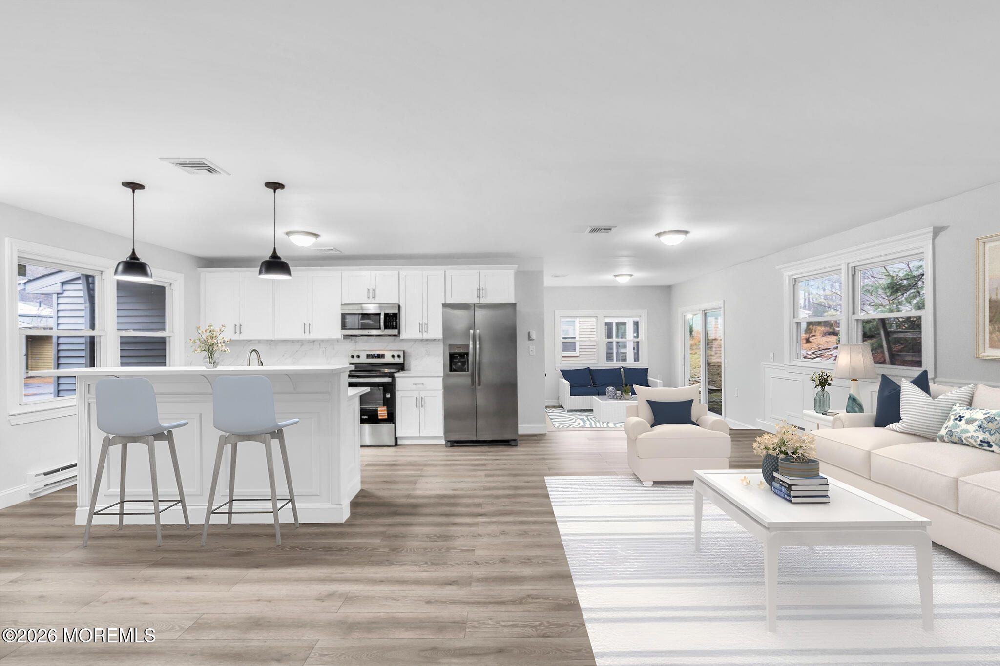 29 Keene Street, Unit 70 Whiting, NJ 08759 - Photo 7 of 18 a living room with lots of furniture and kitchen view