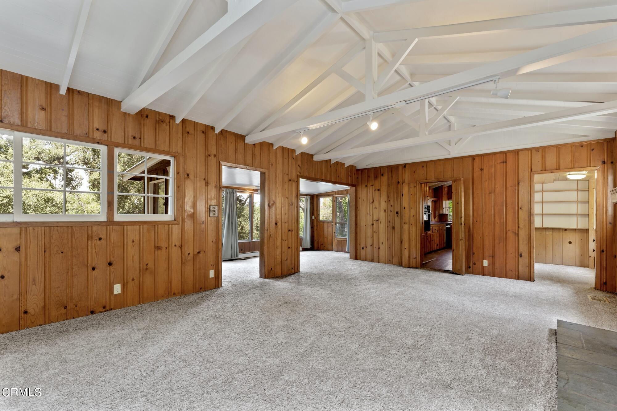 9710 Mistletoe Road Tujunga, CA 91042 - Photo 12 of 68 a view of an empty room with window and cabinet