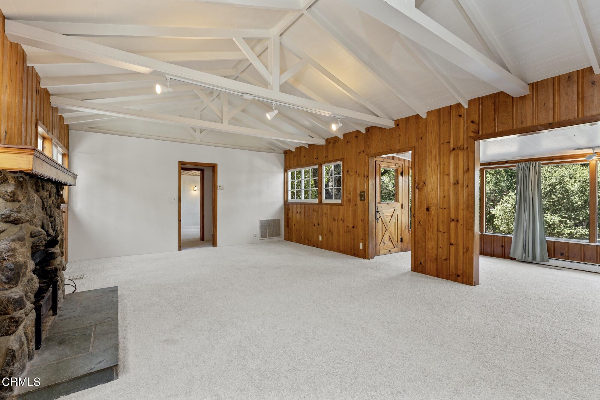 9710 Mistletoe Road Tujunga, CA 91042 - Photo 14 of 68 a view of an empty room with a fireplace