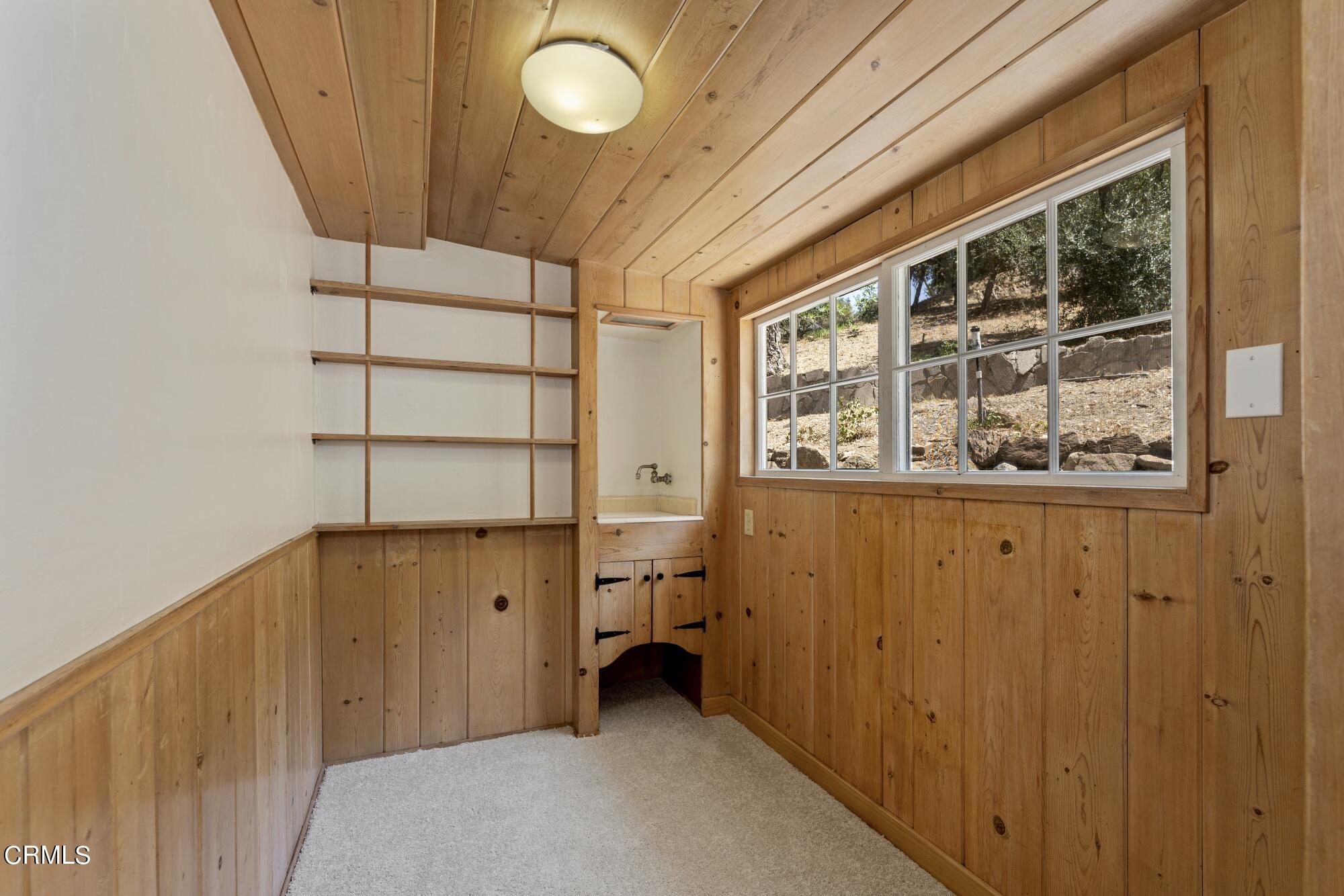 9710 Mistletoe Road Tujunga, CA 91042 - Photo 15 of 68 a view of an empty room with a window
