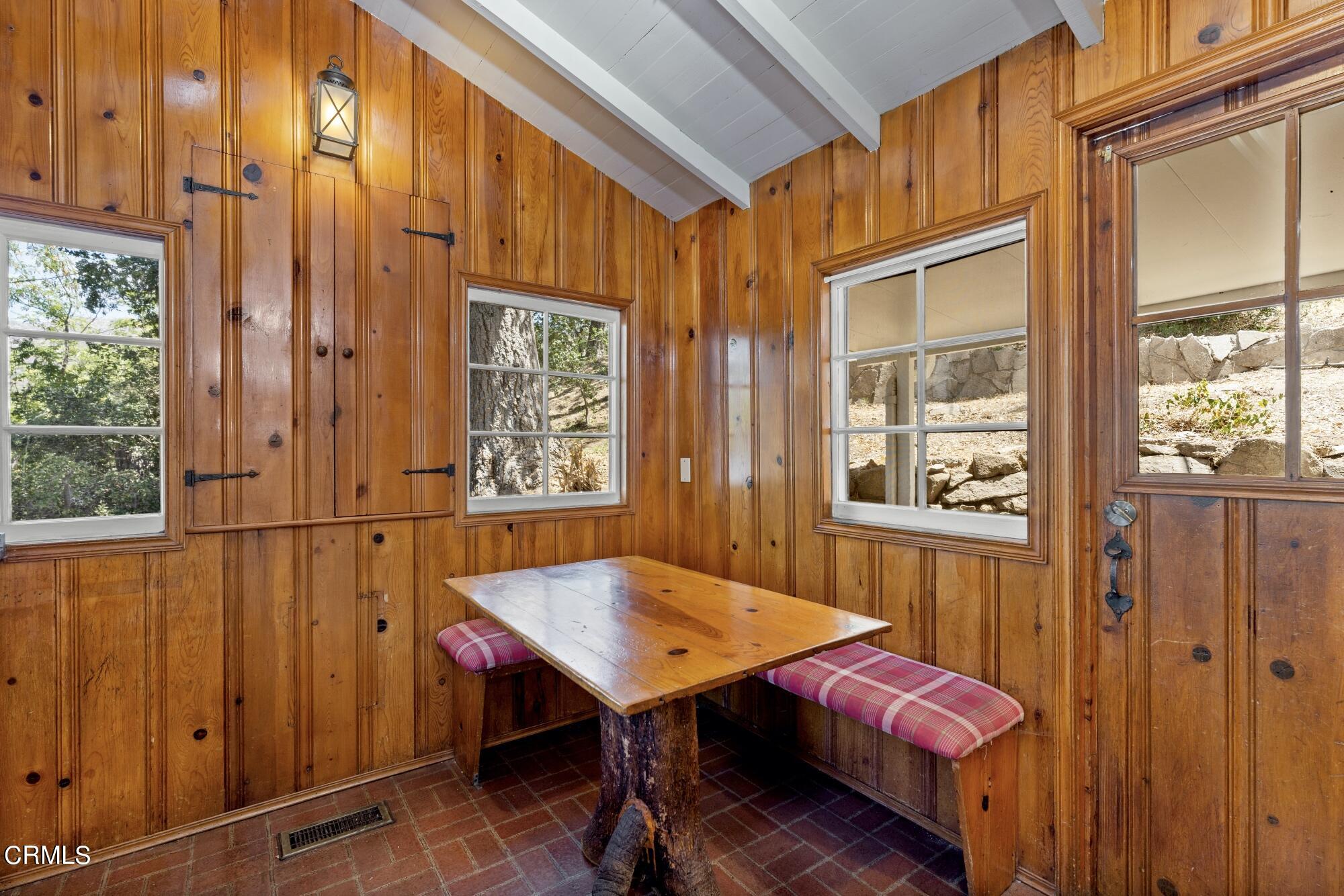 9710 Mistletoe Road Tujunga, CA 91042 - Photo 18 of 68 a view of a balcony with furniture and window
