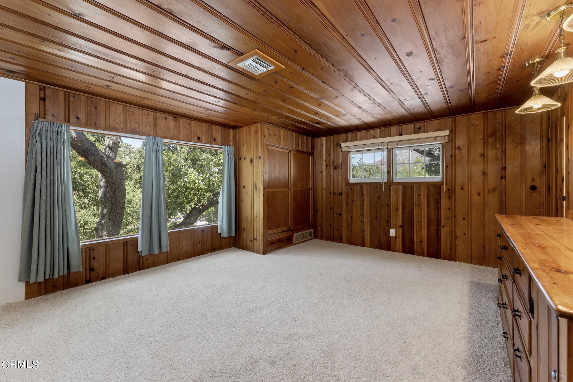 9710 Mistletoe Road Tujunga, CA 91042 - Photo 29 of 68 a view of an empty room with a balcony