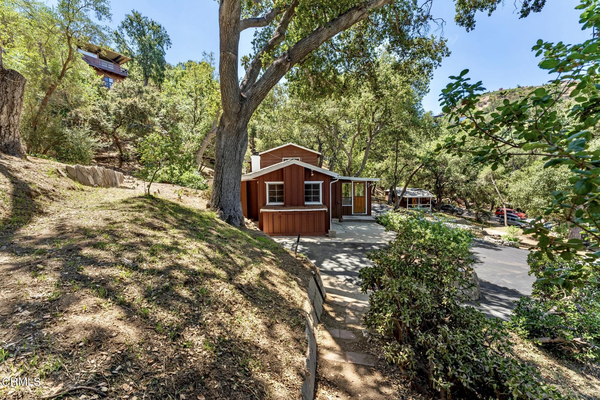 9710 Mistletoe Road Tujunga, CA 91042 - Photo 38 of 68 a view of a house with a small yard