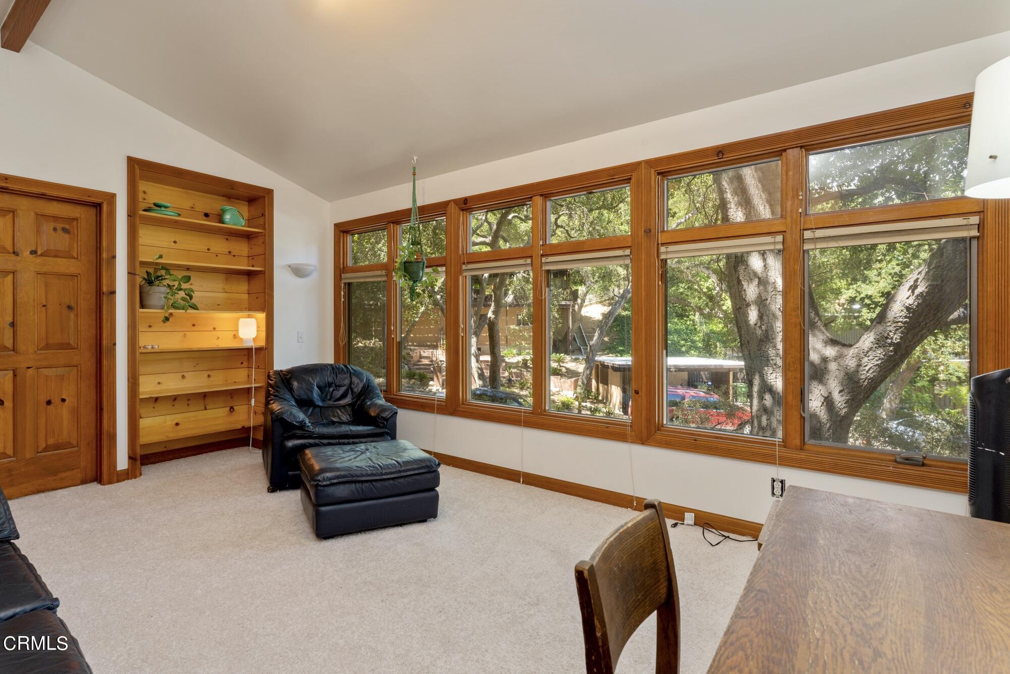 9710 Mistletoe Road Tujunga, CA 91042 - Photo 53 of 68 a living room with furniture and a large window
