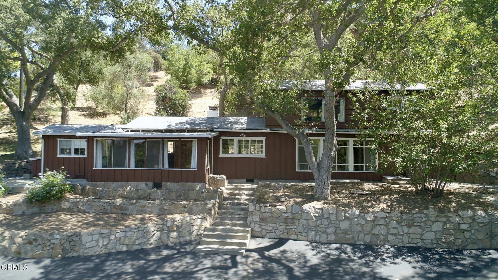 9710 Mistletoe Road Tujunga, CA 91042 - Photo 64 of 68 a front view of a house with garden
