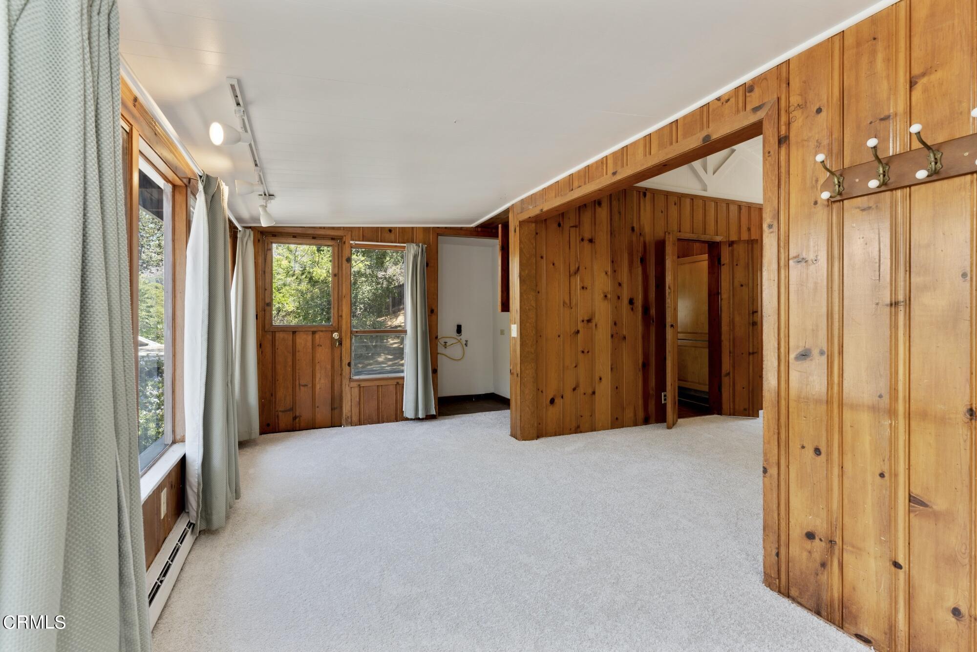 9710 Mistletoe Road Tujunga, CA 91042 - Photo 7 of 68 a view of an empty room with a window
