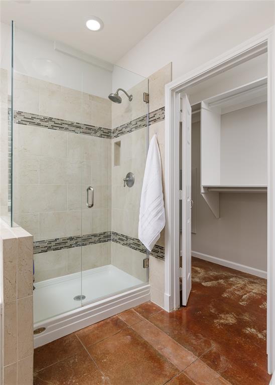 1878 North Lincoln Park Road Van Alstyne, TX 75495 - Photo 16 of 32 a bathroom with a glass shower door