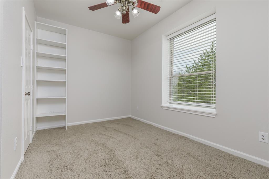 1878 North Lincoln Park Road Van Alstyne, TX 75495 - Photo 19 of 32 an empty room with a window