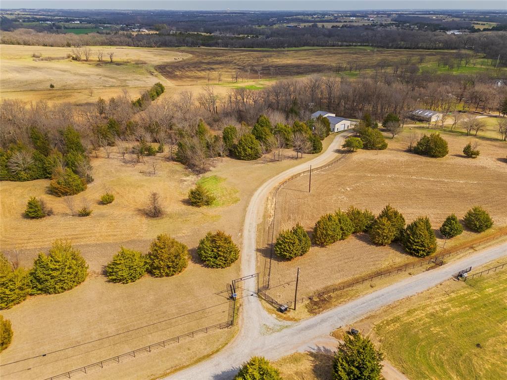 1878 North Lincoln Park Road Van Alstyne, TX 75495 - Photo 26 of 32 a view of a swimming pool with an ocean view