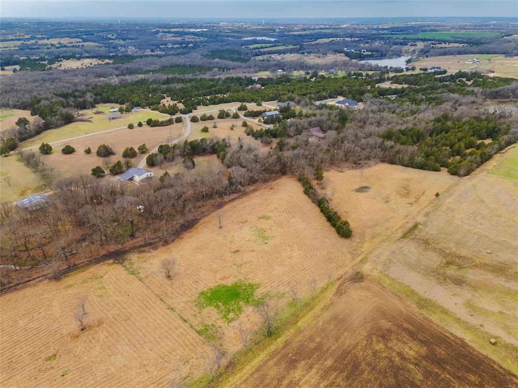 1878 North Lincoln Park Road Van Alstyne, TX 75495 - Photo 30 of 32 a view of a lake with a mountain