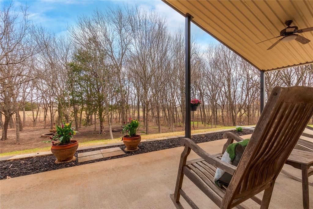 1878 North Lincoln Park Road Van Alstyne, TX 75495 - Photo 3 of 32 a view of street with bench and trees